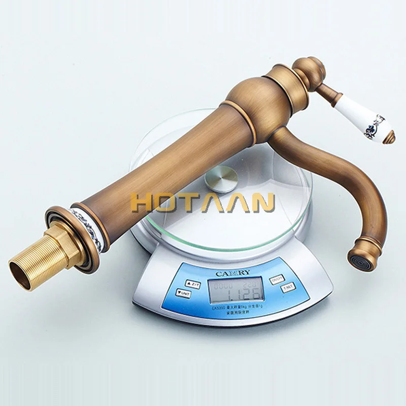 Copper Faucet Antique Brass Finished Hot and Cold with Diamond and Porcelain Mixer Deck Mounted Basin Faucet Tap
Copper Faucet Antique Brass Finished Hot and Cold with Diamond and Porcelain Mixer Deck Mounted Basin Faucet Tap