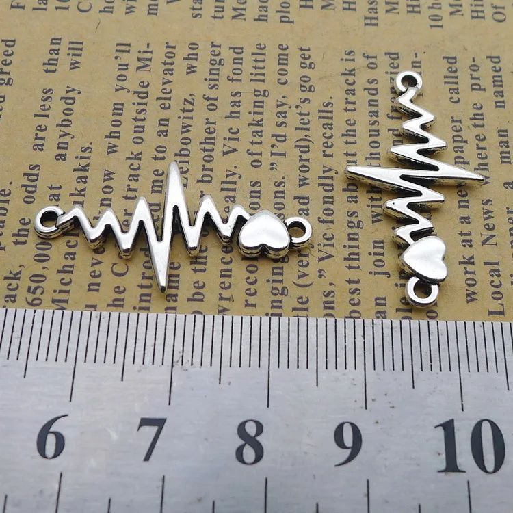100pcs Exquisite Love ECG Connector charms pendants 17*32mm Antique silver bag accessories Jewelry earring bracelet necklace
100pcs Exquisite Love ECG Connector charms pendants 17*32mm Antique silver bag accessories Jewelry earring bracelet necklace