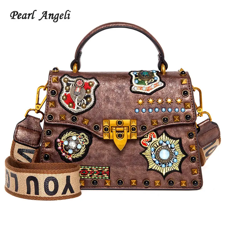 Pearl Angeli Vintage Women Bag Cartoon Printing Rivet Office Ladies PU Leather Crossbody Bag Handbag Bolsas Feminina
Pearl Angeli Vintage Women Bag Cartoon Printing Rivet Office Ladies PU Leather Crossbody Bag Handbag Bolsas Feminina