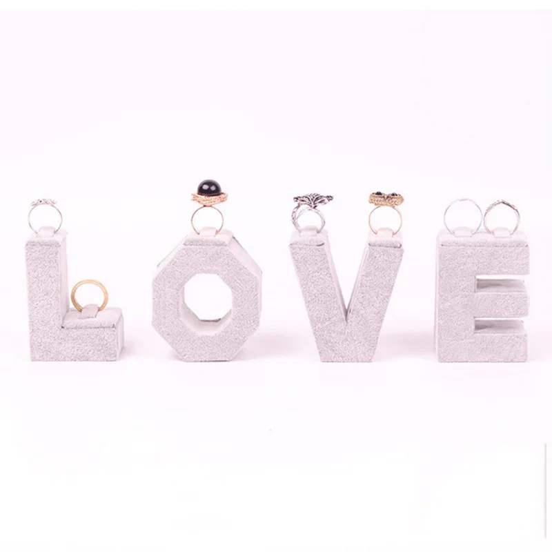 Держатель для свадебного кольца Love Jewelry, полка для хранения, украшение для дома, четыре буквы в форме сердца, органайзер для колец
Держатель для свадебного кольца Love Jewelry, полка для хранения, украшение для дома, четыре буквы в форме сердца, органайзер для колец