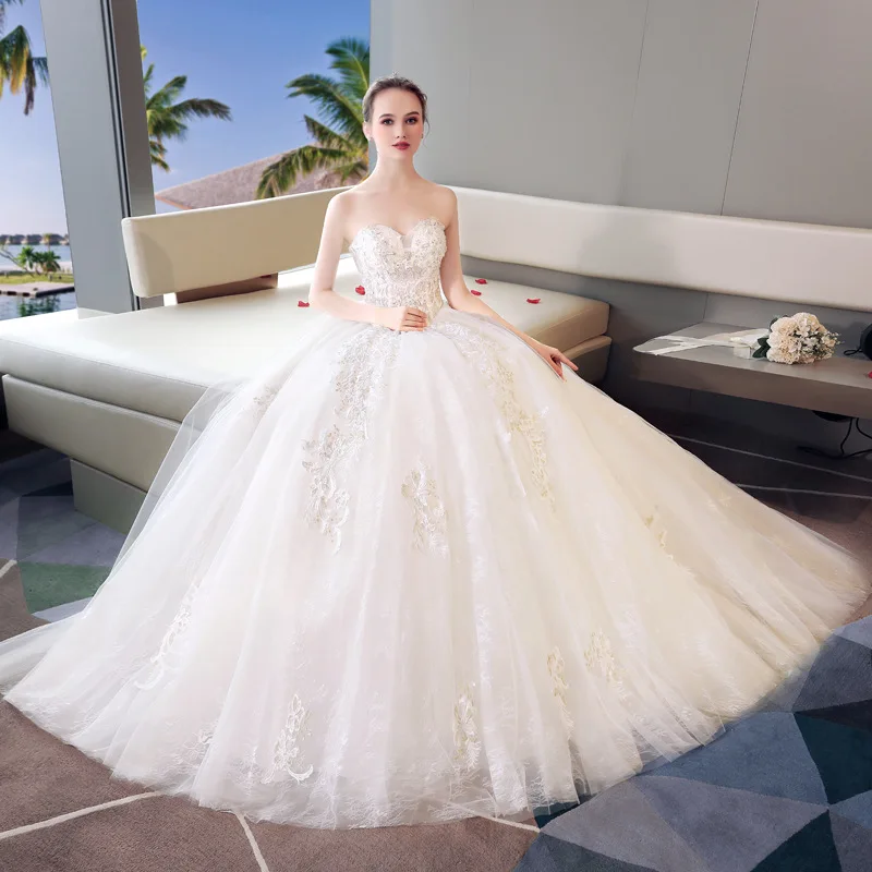 New Ball Gown Ivory Embroidery Sweetheart Tulle Sleeveless Wedding Dress Beading Illusion Lace Vestido De Novia Princess Luxury
New Ball Gown Ivory Embroidery Sweetheart Tulle Sleeveless Wedding Dress Beading Illusion Lace Vestido De Novia Princess Luxury