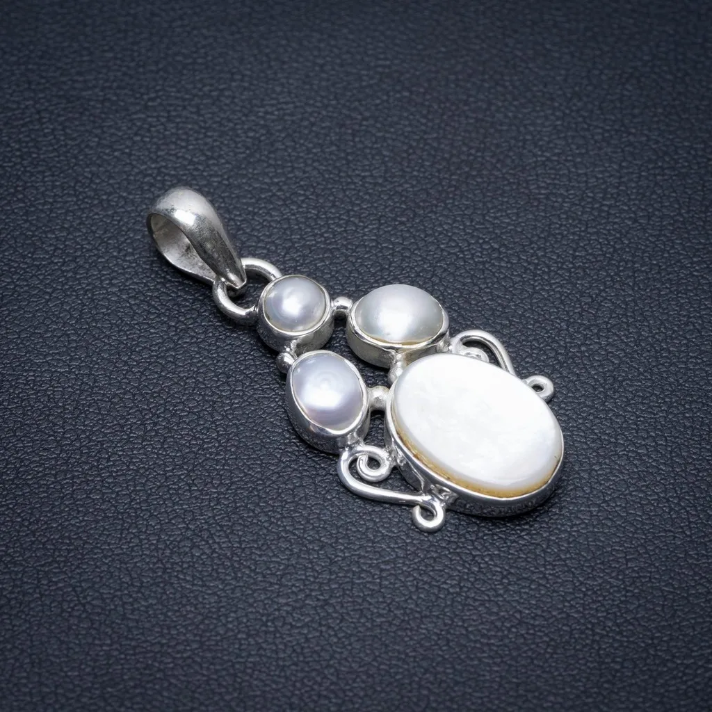 Natural Mother Of Pearl and River Pearl Punk Vintage 925 Sterling Silver Pendant 1 1/2" S1078
Natural Mother Of Pearl and River Pearl Punk Vintage 925 Sterling Silver Pendant 1 1/2" S1078