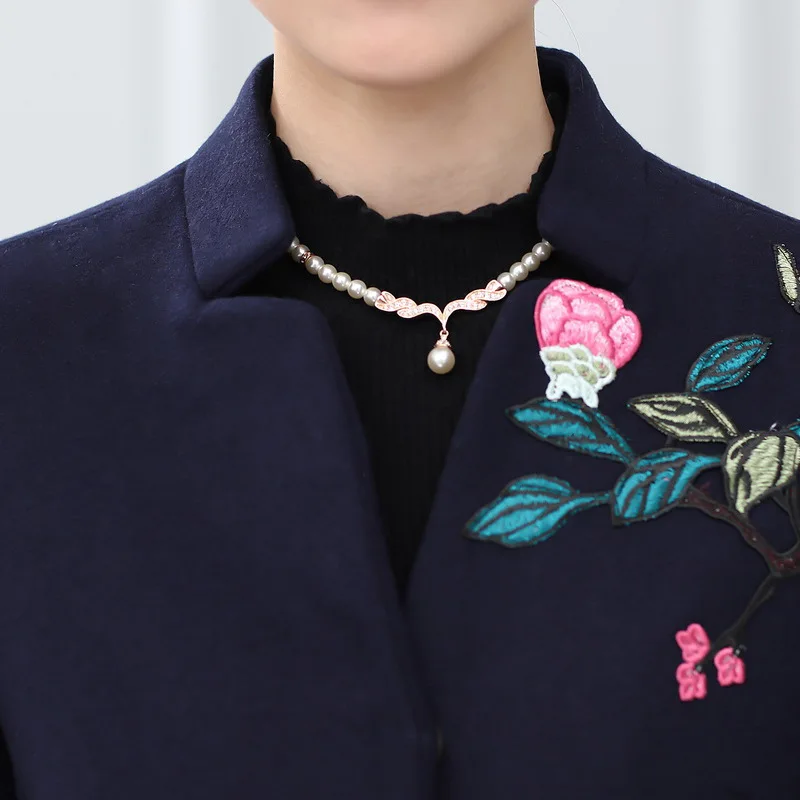 New middle-aged women's autumn and winter clothing in the long section of the woolen coat large size embroidered woolen coat JQ5
New middle-aged women's autumn and winter clothing in the long section of the woolen coat large size embroidered woolen coat JQ5