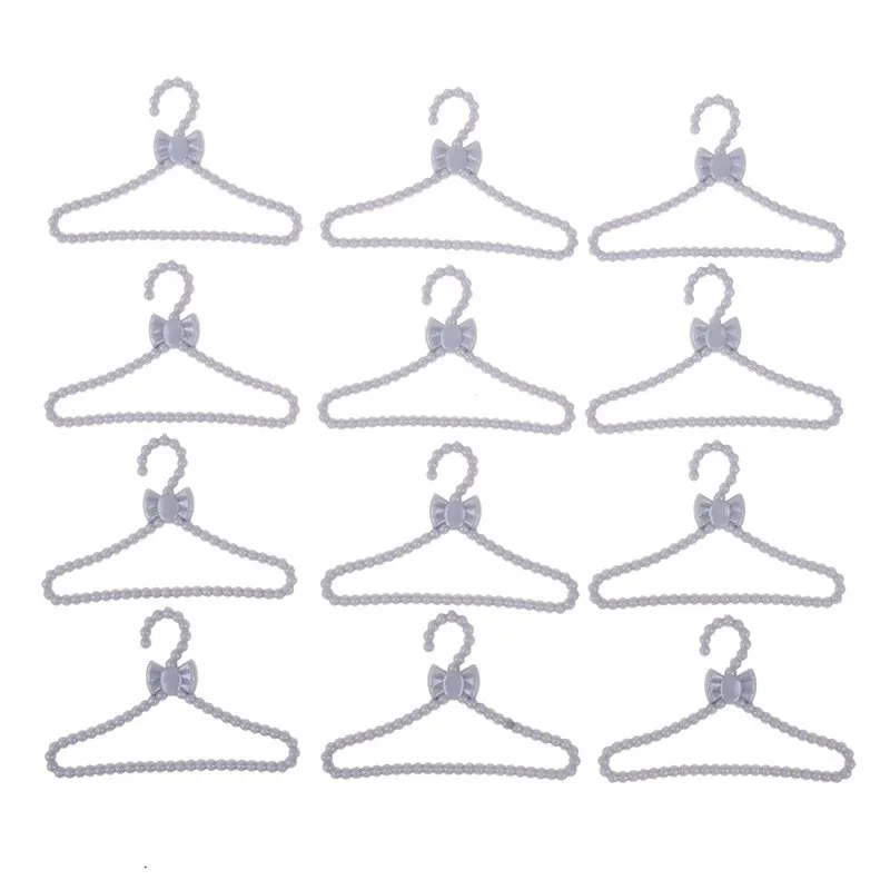 20 Pcs/Lot Mini Silver Gray Hangers Bowknot Design Dollhouse Dress Clothes 1/6 For Babi Doll Girls' Gift Toy DIY Accessories 
20 Pcs/Lot Mini Silver Gray Hangers Bowknot Design Dollhouse Dress Clothes 1/6 For Babi Doll Girls' Gift Toy DIY Accessories