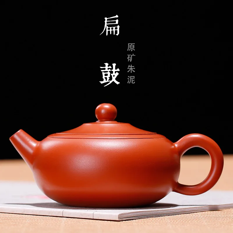 Yixing purple sand tea set undressed ore zhu mud flat drum pot sketch the teapot dc pot wholesale small number
Yixing purple sand tea set undressed ore zhu mud flat drum pot sketch the teapot dc pot wholesale small number