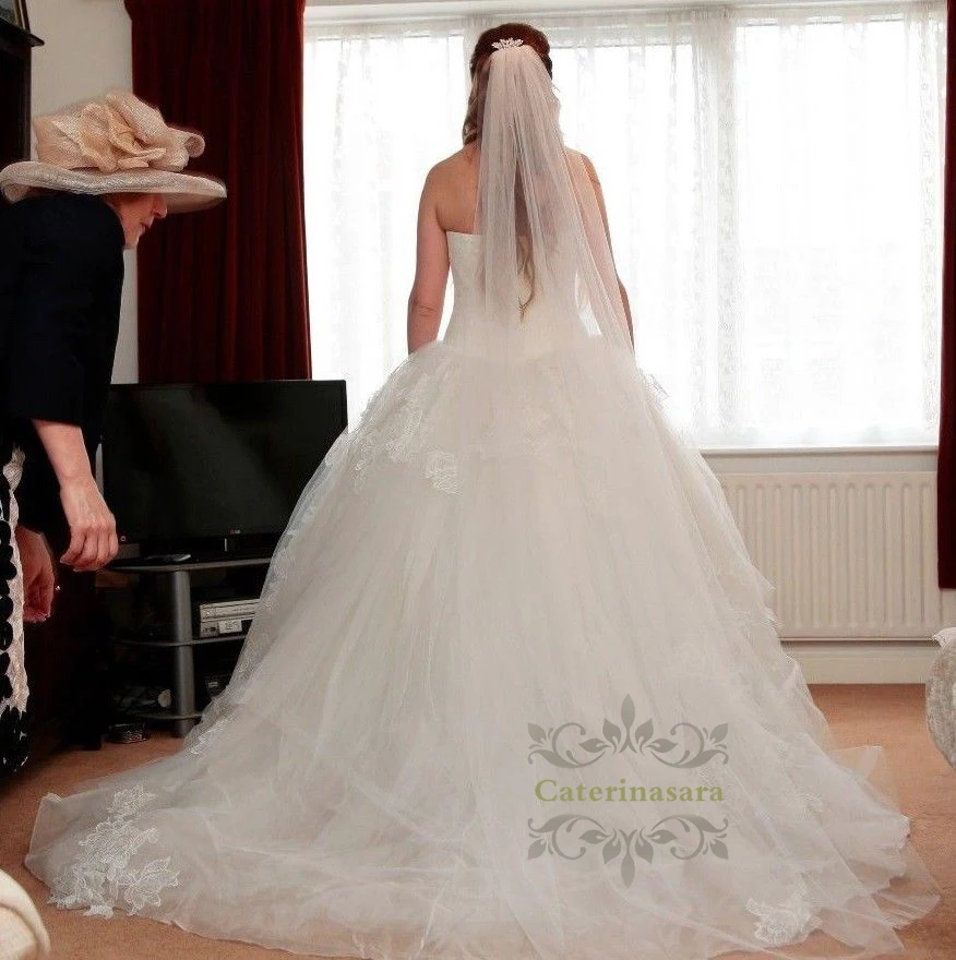 Princess Ball Gown Wedding Dresses Lace Appliques Puffy Skirt Tulle Bridal Gowns vestido blanco Long Sleeveless Wedding Dress
Princess Ball Gown Wedding Dresses Lace Appliques Puffy Skirt Tulle Bridal Gowns vestido blanco Long Sleeveless Wedding Dress