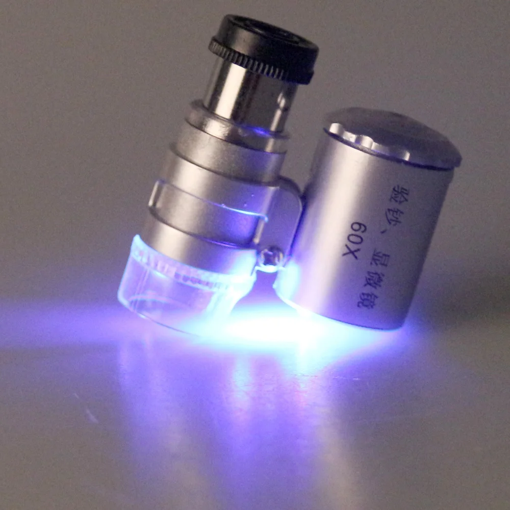 New Mini 60X Microscope LED Jewellery Loupe UV Currency Detector Portable Magnifier Magnifying Glass Eye Lens with LED Light
New Mini 60X Microscope LED Jewellery Loupe UV Currency Detector Portable Magnifier Magnifying Glass Eye Lens with LED Light
