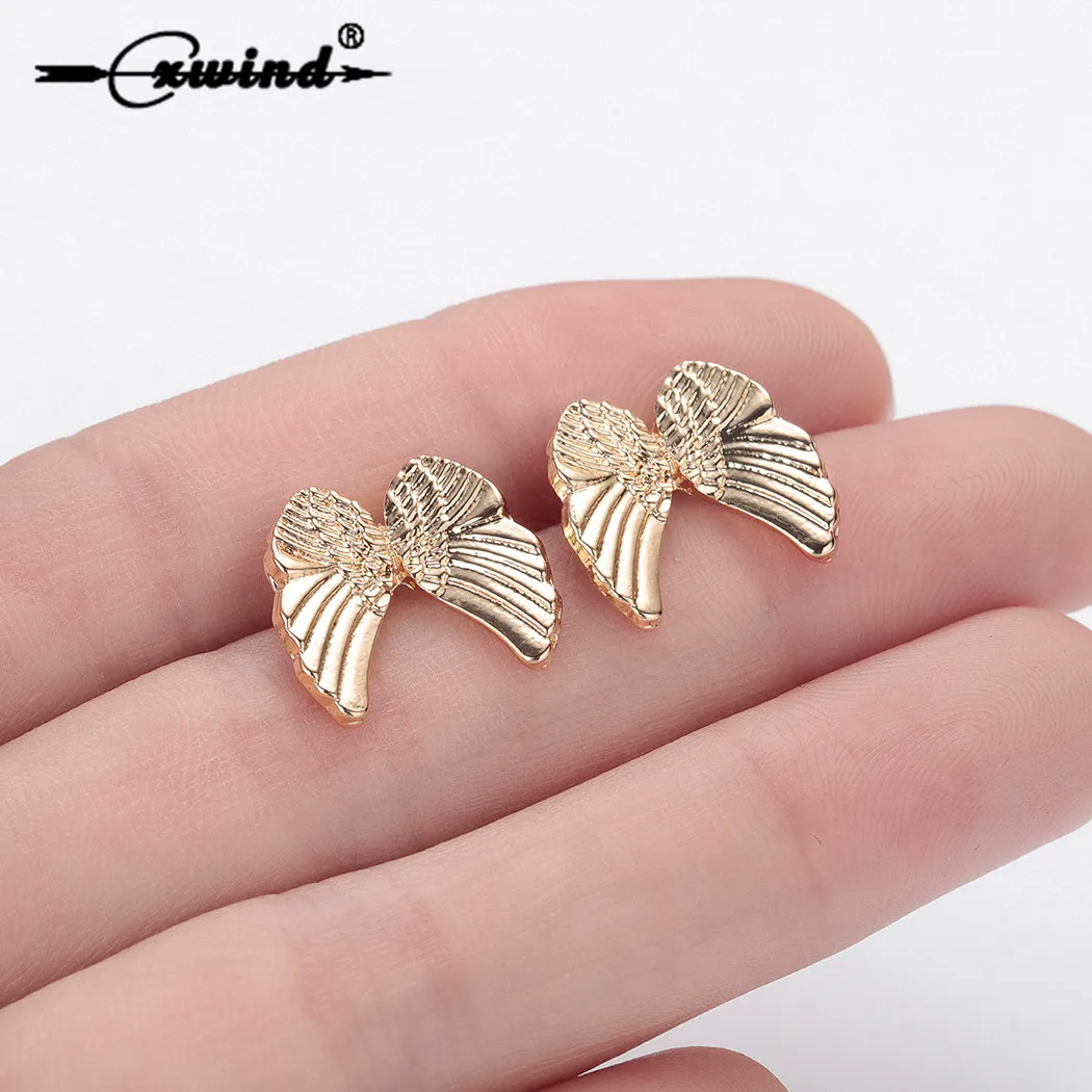Cxwind New Angel Wings Design Srud Earrings for Women Boho Piercing Earrings Stud Christmas Gift boucle d'oreille femme
Cxwind New Angel Wings Design Srud Earrings for Women Boho Piercing Earrings Stud Christmas Gift boucle d'oreille femme