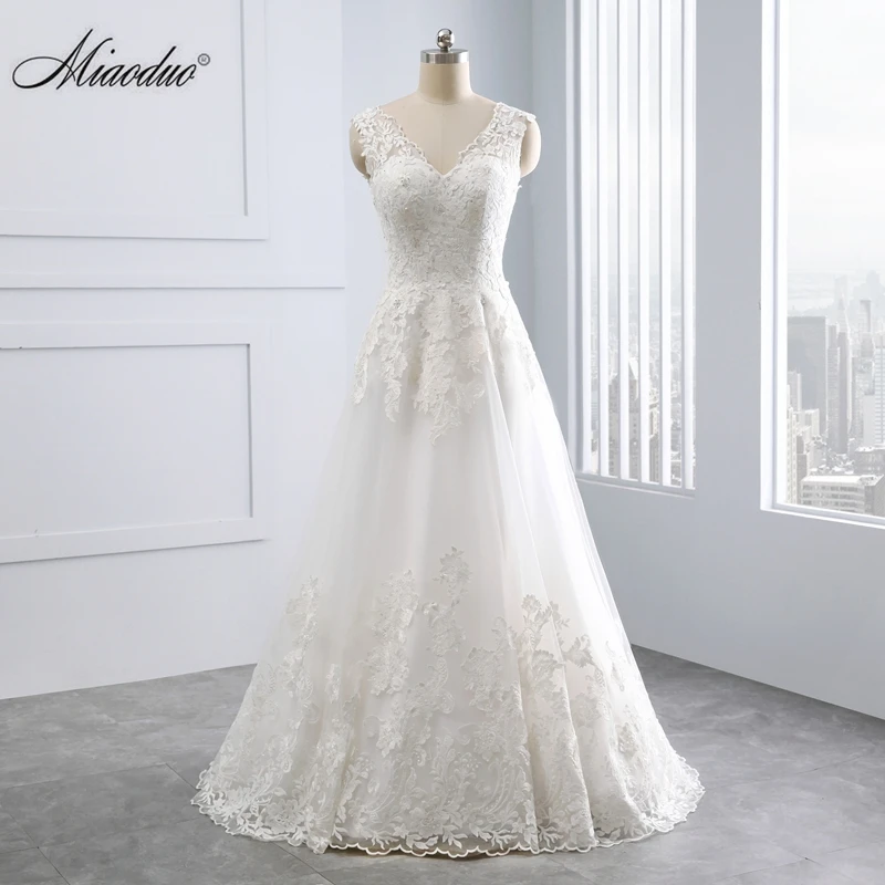 Miaodu Romantic Wedding Dress A-Line with Lace Appliques Robe de mariage Illusion Back Count Train Bridal Gowns vestido de noiva
Miaodu Romantic Wedding Dress A-Line with Lace Appliques Robe de mariage Illusion Back Count Train Bridal Gowns vestido de noiva