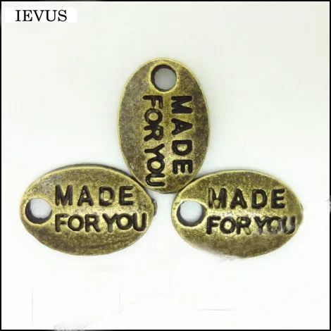 Hot selling 20 Pieces/Lot 11mm*7mm antique bronze Plated message tag charm word made for you charm diy charms For Jewelry Making
Hot selling 20 Pieces/Lot 11mm*7mm antique bronze Plated message tag charm word made for you charm diy charms For Jewelry Making