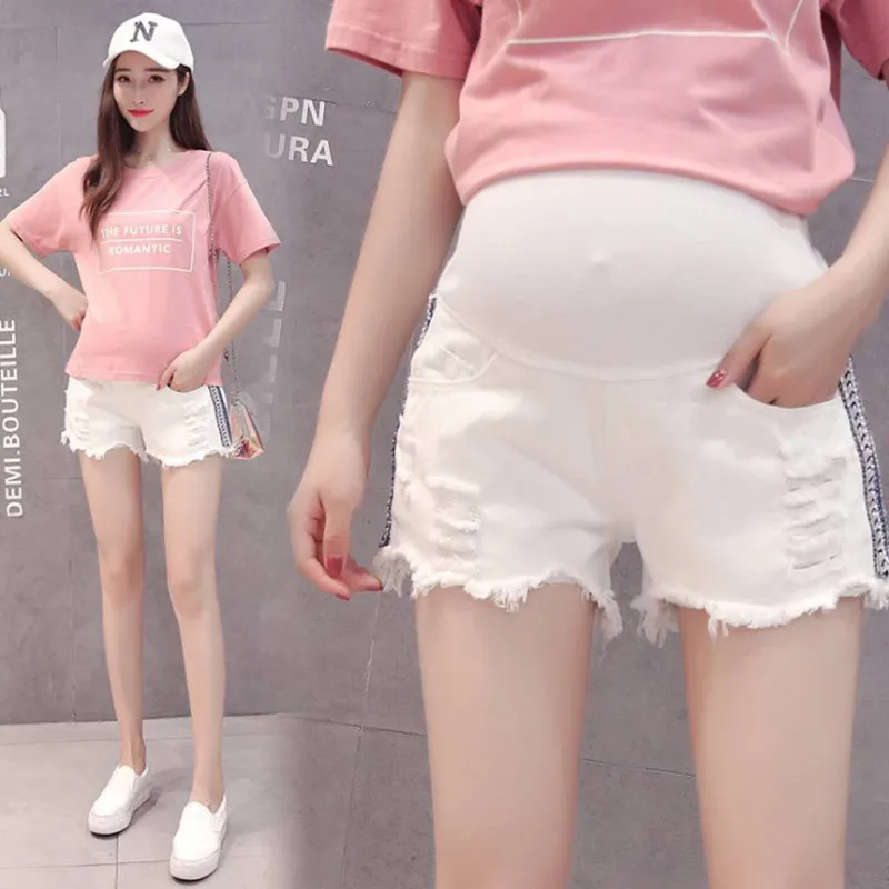 2019 summer pregnancy thin shorts maternity white hole denim shorts fashion side ribbon pregnant women stomach lift shorts
2019 summer pregnancy thin shorts maternity white hole denim shorts fashion side ribbon pregnant women stomach lift shorts