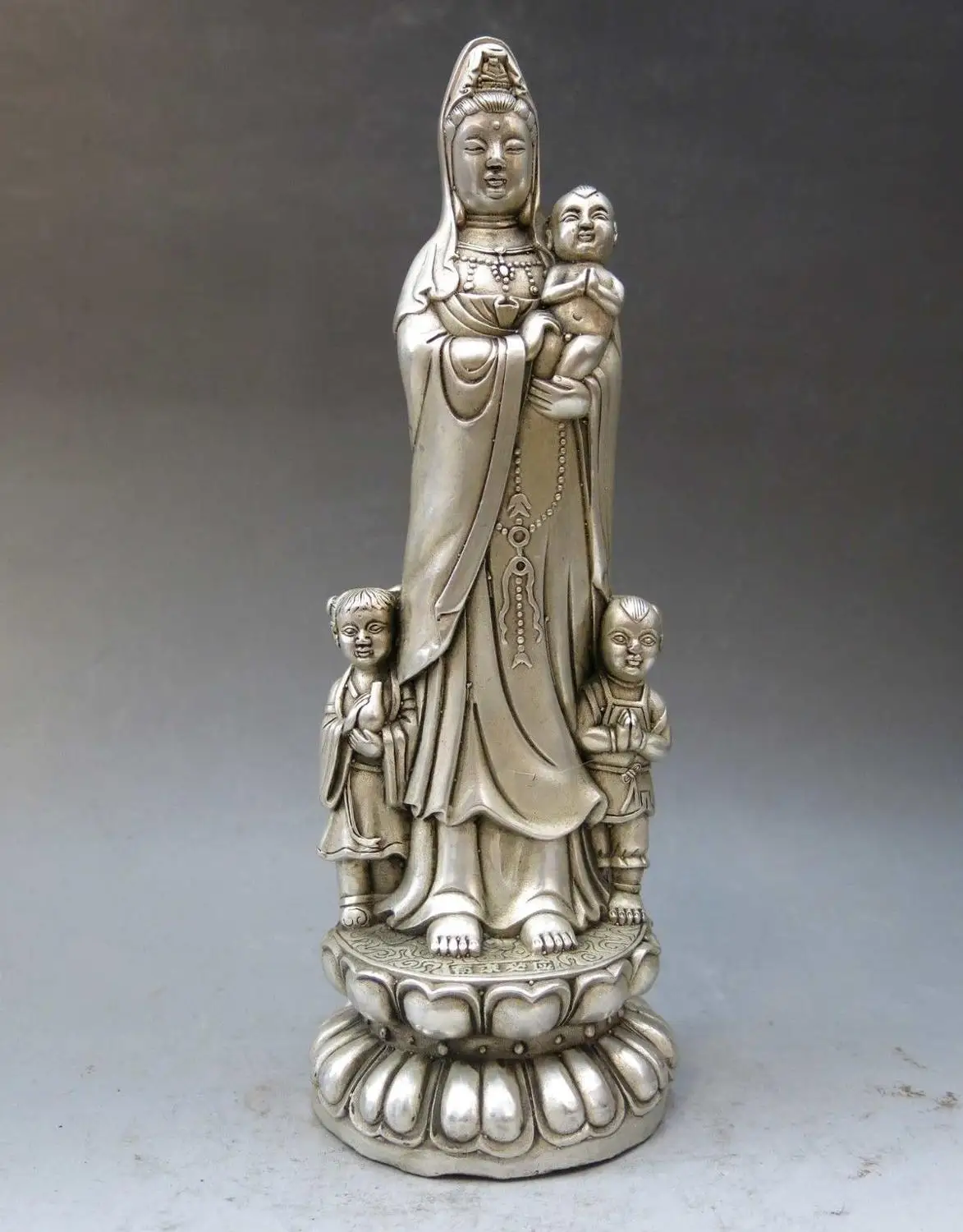 China silver handwork carved buddhism Kwan-yin blessing boy fine Guanyin Statue
China silver handwork carved buddhism Kwan-yin blessing boy fine Guanyin Statue