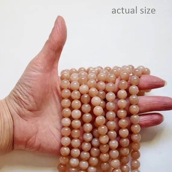 Genuine Peach Moonstone Beads - Round 10 mm Gemstone Beads - Full Strand 15 1/2", 40 beads, A-Quality, Item 2
Genuine Peach Moonstone Beads - Round 10 mm Gemstone Beads - Full Strand 15 1/2", 40 beads, A-Quality, Item 2