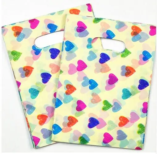 15*20cm Colourful Heart Small Plastic Gift Packaging Hot Plastic Bags With Handle Jewelry Packaging100pcs/lot
15*20cm Colourful Heart Small Plastic Gift Packaging Hot Plastic Bags With Handle Jewelry Packaging100pcs/lot