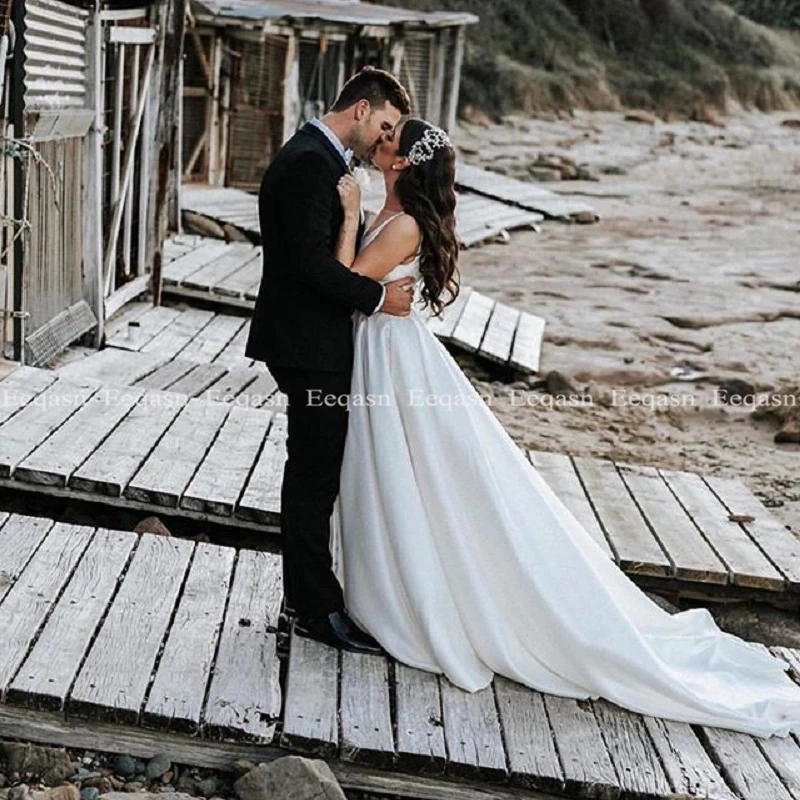Custom Made Vestido de noiva A Line Satin Wedding Dress with Pockets White Ivory Beach Long Train Bridal Gowns
Custom Made Vestido de noiva A Line Satin Wedding Dress with Pockets White Ivory Beach Long Train Bridal Gowns