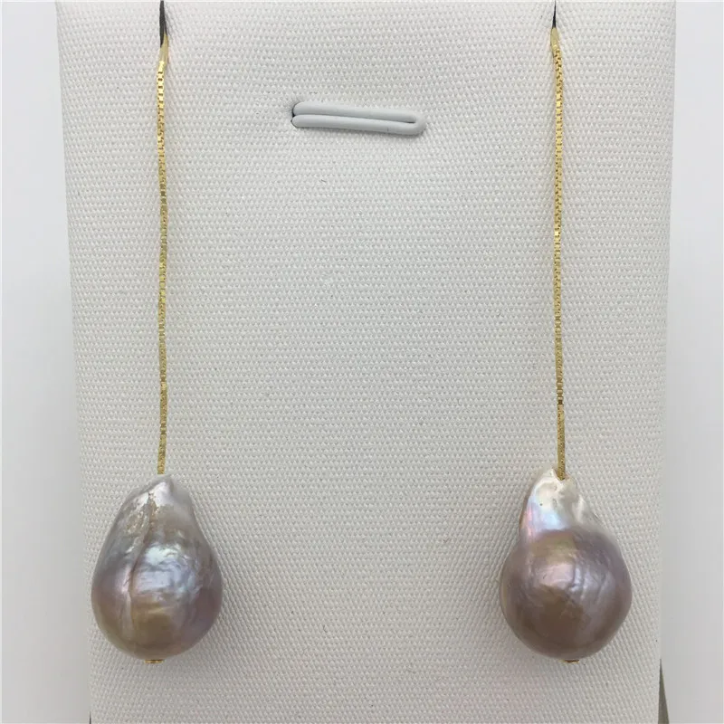 NEW Natural freshwater pearl purple baroque about 13 x18mm Tibetan silver earrings
NEW Natural freshwater pearl purple baroque about 13 x18mm Tibetan silver earrings