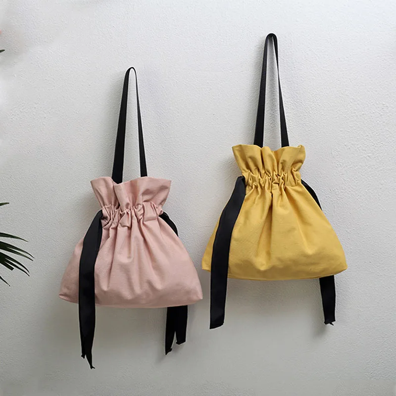 CASMOR Simple Casual Harajuku Totes 2018 Women Canvas Solid Travel Drawstring Shoulder Bags For Girls Vintage Crossbody Bag
CASMOR Simple Casual Harajuku Totes 2018 Women Canvas Solid Travel Drawstring Shoulder Bags For Girls Vintage Crossbody Bag
