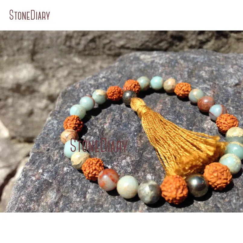 Золотистый хлопковый браслет с кисточкой Rudraksha & Pyrite в богемном стиле, браслет с бусинами 27 четвертей Mala Aqua Terra Jaspers BM11057
Золотистый хлопковый браслет с кисточкой Rudraksha & Pyrite в богемном стиле, браслет с бусинами 27 четвертей Mala Aqua Terra Jaspers BM11057