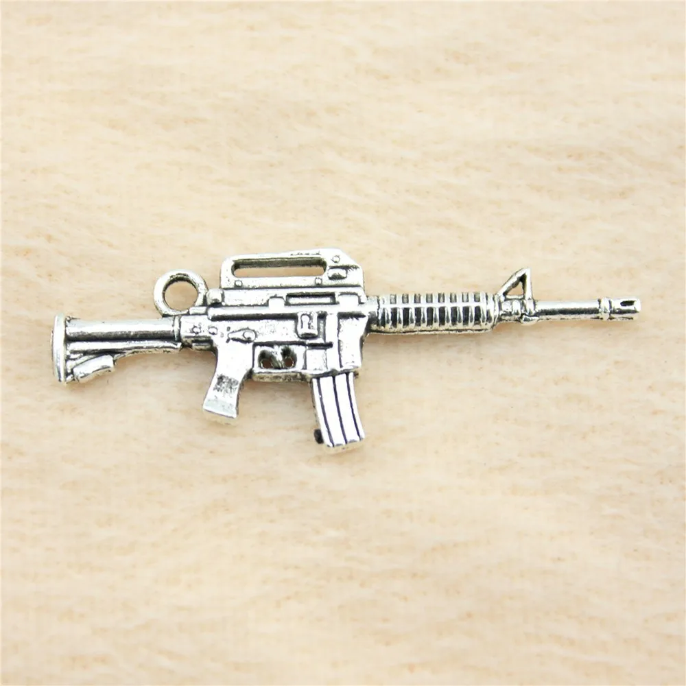 24pcs/lot 45*16mm ancient silver Gun charm Pendants DIY jewelry for bracelet necklace earring
24pcs/lot 45*16mm ancient silver Gun charm Pendants DIY jewelry for bracelet necklace earring