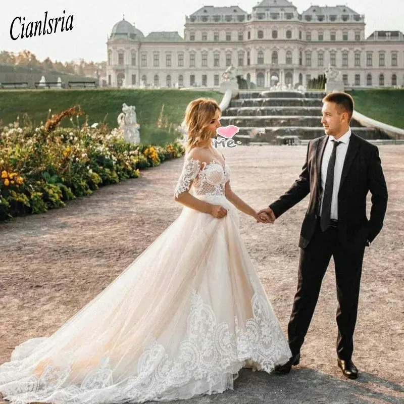New Arrival Lace Ball Gown Wedding Dress Sexy Tulle Appliques Long Sleeve Vestido De Noiva Romantic Champagne Wedding Gowns
New Arrival Lace Ball Gown Wedding Dress Sexy Tulle Appliques Long Sleeve Vestido De Noiva Romantic Champagne Wedding Gowns
