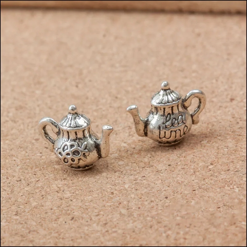 Factory price 10 Pieces/Lot 13mm*16mm antique Silver plated tea pot charm diy handmade craft For Jewelry Making
Factory price 10 Pieces/Lot 13mm*16mm antique Silver plated tea pot charm diy handmade craft For Jewelry Making