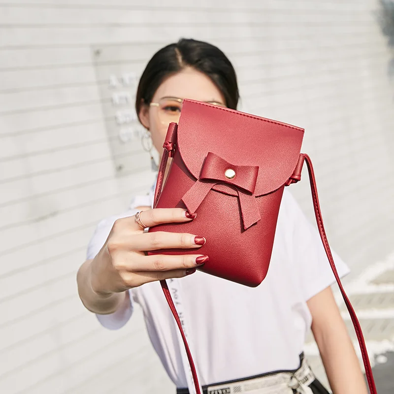 Mini diagonal mobile phone bag bow pu leather 2018 new fashion single shoulder Messenger bag small square bag NB097
Mini diagonal mobile phone bag bow pu leather 2018 new fashion single shoulder Messenger bag small square bag NB097