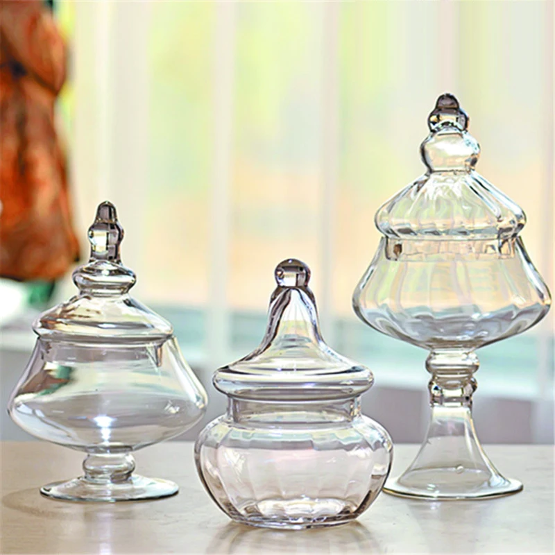 Creative transparent Glass candy jar bottles dust-proof with lid Decor Crafts dessert stand storage tank vase wedding supplies
Creative transparent Glass candy jar bottles dust-proof with lid Decor Crafts dessert stand storage tank vase wedding supplies