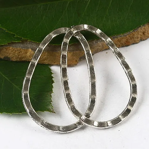 20pcs Tibetan Silver color egg shaped frame connector h2477 
20pcs Tibetan Silver color egg shaped frame connector h2477