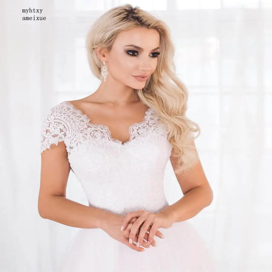 Sexy Elegant Cap Sleeve Lace Tulle Cheap Wedding Dress 2020 V-neck Sleeveless White/ Ivory A-line Bridal Gonws Vestidos De Novia 
Sexy Elegant Cap Sleeve Lace Tulle Cheap Wedding Dress 2020 V-neck Sleeveless White/ Ivory A-line Bridal Gonws Vestidos De Novia