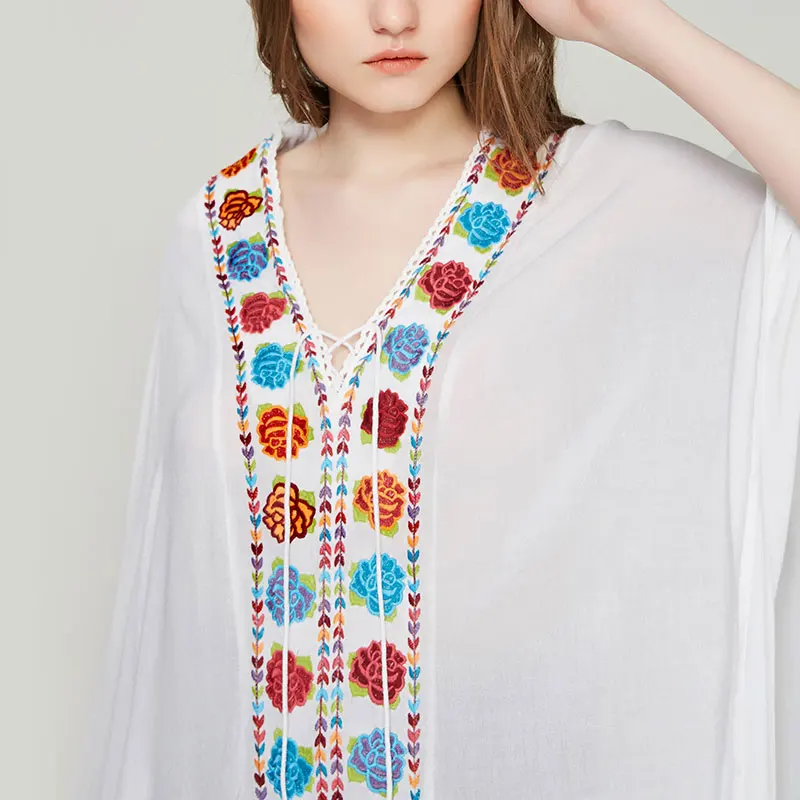 Summer vacation Bohemian beach dress white v-necked rose embroidered Turkish robe dress
Summer vacation Bohemian beach dress white v-necked rose embroidered Turkish robe dress