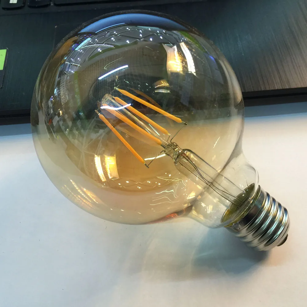 G95 LED 4W Gold Filament bulb E27 LED Filament Light 220V Vintage Edison Bulb Lamp Retro Incandescent Gold Glass Appearance
G95 LED 4W Gold Filament bulb E27 LED Filament Light 220V Vintage Edison Bulb Lamp Retro Incandescent Gold Glass Appearance