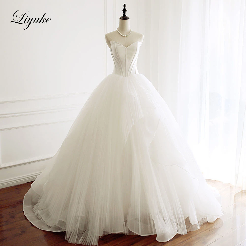 Liyuke Strapless A Line Wedding Dress With Pleat Tulle Skirt Lace Up Back Closure Puffy Bridal Dress
Liyuke Strapless A Line Wedding Dress With Pleat Tulle Skirt Lace Up Back Closure Puffy Bridal Dress