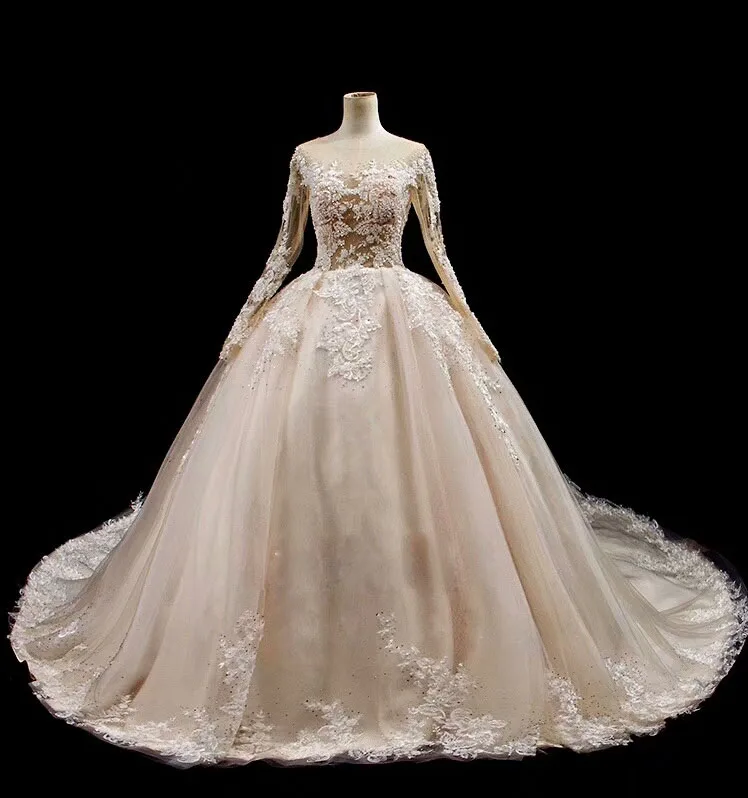 Robes De Mariee Musulmane Luxury Ball Gown Long Sleeves Wedding Dress Champagne Lace Appliques Rhinestones Wedding Gown W53
Robes De Mariee Musulmane Luxury Ball Gown Long Sleeves Wedding Dress Champagne Lace Appliques Rhinestones Wedding Gown W53