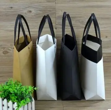 15pcs/lot Hot New Fashion Paper Shopping Bag With Handle Brown Paper Gift Packing Bag Black Paper Shops Garment Bag
15pcs/lot Hot New Fashion Paper Shopping Bag With Handle Brown Paper Gift Packing Bag Black Paper Shops Garment Bag