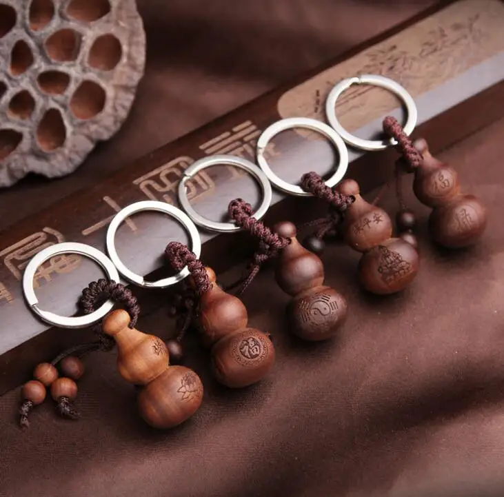 Chinese Peach Wood Carved Word Safe And Good Luck Good Fortune Word Ebony Gourd Cucurbit Exquisite Car Key Chain Pendant
Chinese Peach Wood Carved Word Safe And Good Luck Good Fortune Word Ebony Gourd Cucurbit Exquisite Car Key Chain Pendant
