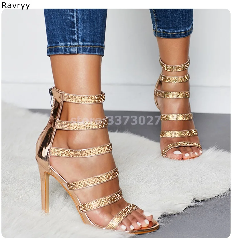 Golden woman's sandal narrow band crystal decor thin heel female party dress shoes high heels summer fashion open toe stiletto
Golden woman's sandal narrow band crystal decor thin heel female party dress shoes high heels summer fashion open toe stiletto