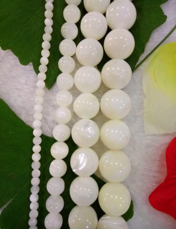 Фото Натуральный камень белая перламутровая швабра круглые свободные бусины
