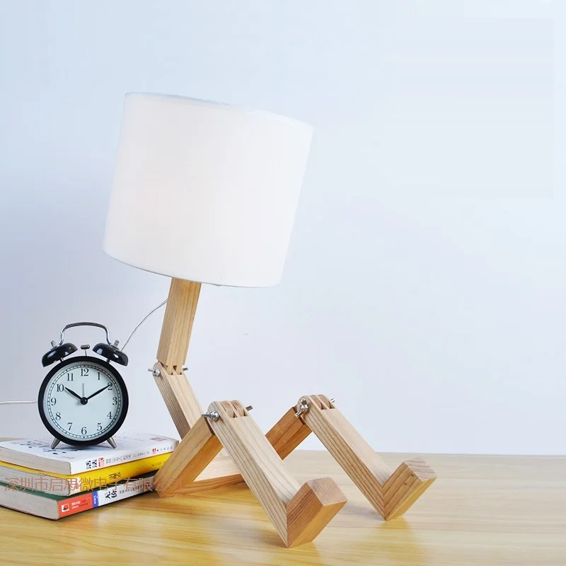 Creative Gifts Foldable Robot Desk Lamps Wooden base Table Lamp Modern Lampara as Home Decor Bedroom Reading Nightlight
Creative Gifts Foldable Robot Desk Lamps Wooden base Table Lamp Modern Lampara as Home Decor Bedroom Reading Nightlight