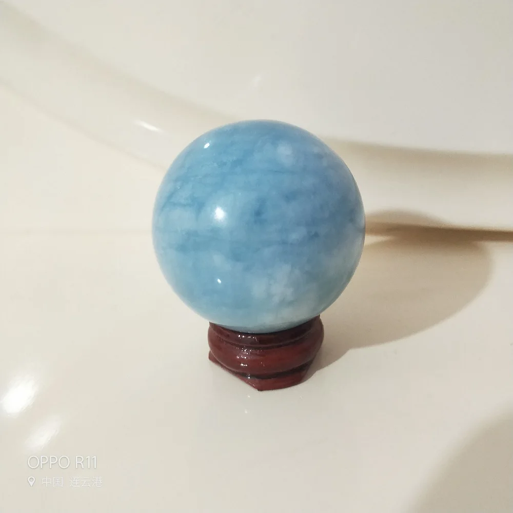 Crystal spherical Natural Aquamarine ball Aquamarine bead+wood base The goods you receive will be the same as the picture
Crystal spherical Natural Aquamarine ball Aquamarine bead+wood base The goods you receive will be the same as the picture