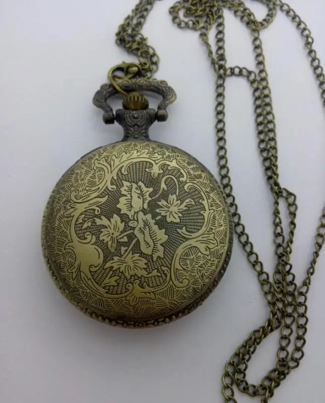 Vintage bronze Decorative pattern Good quality quartz Flip hours steampunk men and woman Necklace pocket watches
Vintage bronze Decorative pattern Good quality quartz Flip hours steampunk men and woman Necklace pocket watches