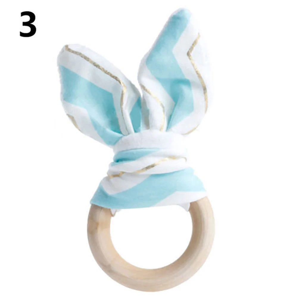 Hot Cute Wooden Natural Chewing Teether Bunny Sensory Toy Infant Baby Teething Ring
Hot Cute Wooden Natural Chewing Teether Bunny Sensory Toy Infant Baby Teething Ring