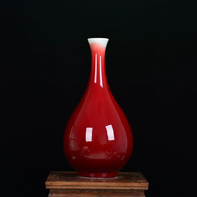 Jingdezhen ceramics Lang red pomegranate open modern and stylish living room decoration decoration vase size
Jingdezhen ceramics Lang red pomegranate open modern and stylish living room decoration decoration vase size