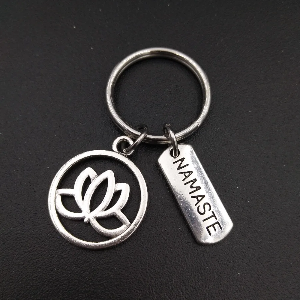 Yoga Namaste Charm Keychain Stainless Steel Keyring Fashion Om Ohm Aum Jewelry Gift for Women Wholesale Price
Yoga Namaste Charm Keychain Stainless Steel Keyring Fashion Om Ohm Aum Jewelry Gift for Women Wholesale Price