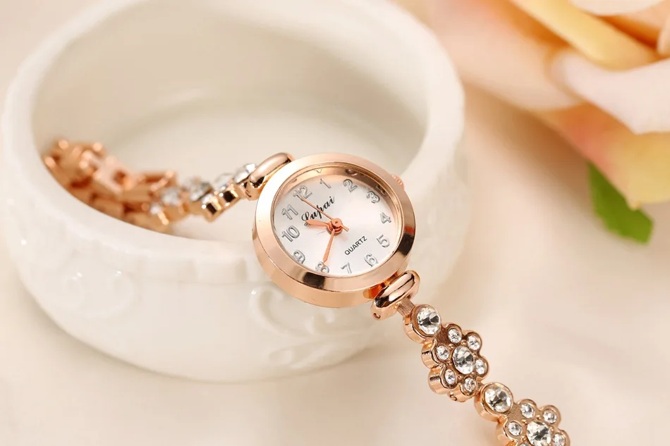 Watch trend student female watch ladies flower bracelet watch alloy ladies watch wholesale
Watch trend student female watch ladies flower bracelet watch alloy ladies watch wholesale