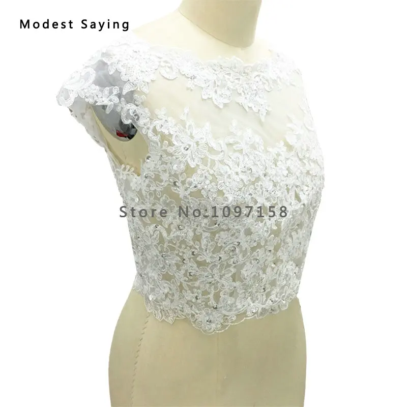 Real Elegant Ivory Lace Beaded Bridal Boleros 2017 White Cap Sleeve Wedding Jacket with Buttons Applique Wedding Accessories B9
Real Elegant Ivory Lace Beaded Bridal Boleros 2017 White Cap Sleeve Wedding Jacket with Buttons Applique Wedding Accessories B9