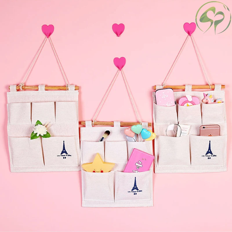 Cotton Linen Home Wall Hanging Storage Pocket Bag Mounted Wardrobe Hanging Bag Pouch Cosmetic Toys Organizer
Cotton Linen Home Wall Hanging Storage Pocket Bag Mounted Wardrobe Hanging Bag Pouch Cosmetic Toys Organizer