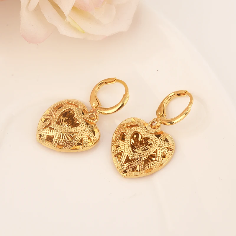 gold love drop earring Ethiopian/Nigeria/Kenya /Ghana Gold color Dubai african Arab Middle Eastern Jewelry Mom Gifts
gold love drop earring Ethiopian/Nigeria/Kenya /Ghana Gold color Dubai african Arab Middle Eastern Jewelry Mom Gifts