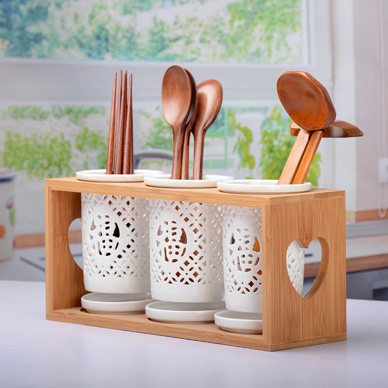Household ceramic chopsticks storage rack storage porous drainage spoon / knife and fork kitchen supplies storage accessories
Household ceramic chopsticks storage rack storage porous drainage spoon / knife and fork kitchen supplies storage accessories