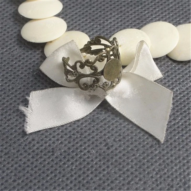 RONGQING 50pcs/lot Antique Bronze Round Ring Cabochon Base 8mm Inner Size Adjustable Ring Base Jewelry Accessories
RONGQING 50pcs/lot Antique Bronze Round Ring Cabochon Base 8mm Inner Size Adjustable Ring Base Jewelry Accessories