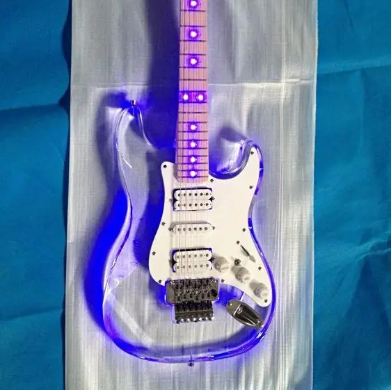 Free shipping acrylic body electrc guitar fr bridge with led light fingerboard blue led
Free shipping acrylic body electrc guitar fr bridge with led light fingerboard blue led